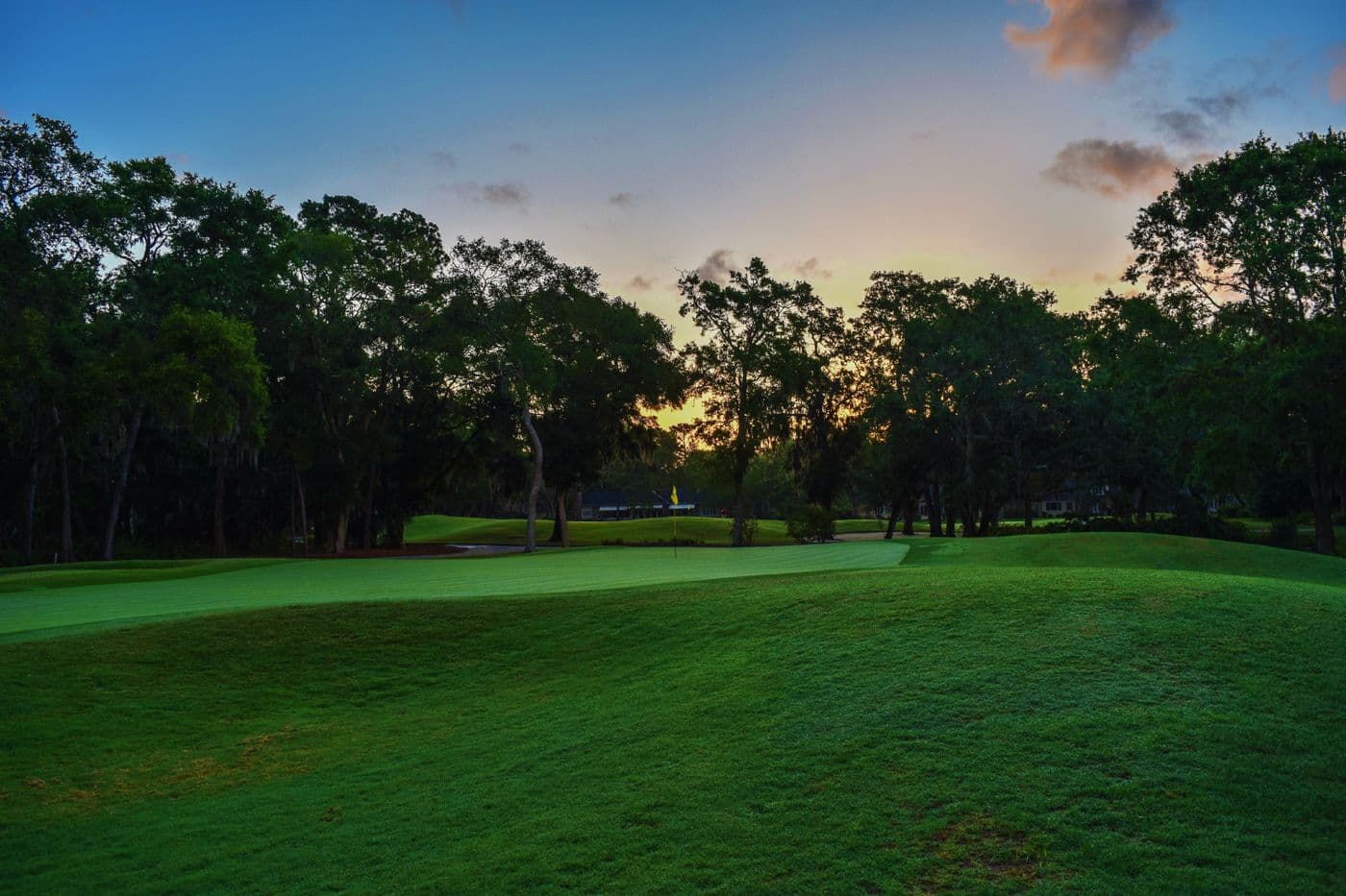 Golfer teeing off on a UK course